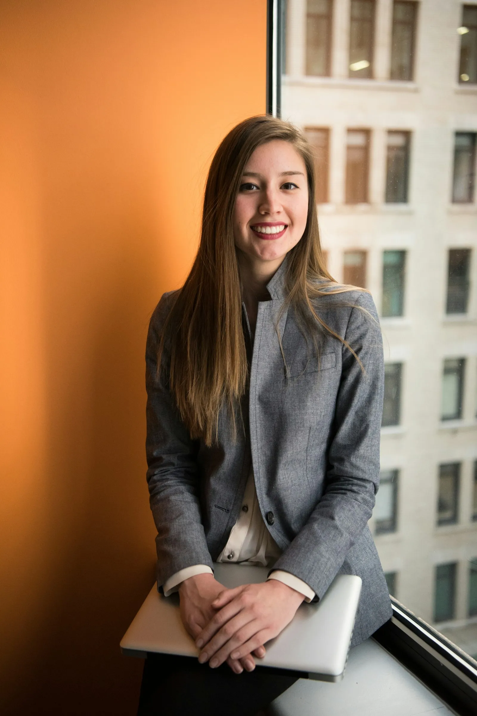Professional smiling before an interview in a modern office