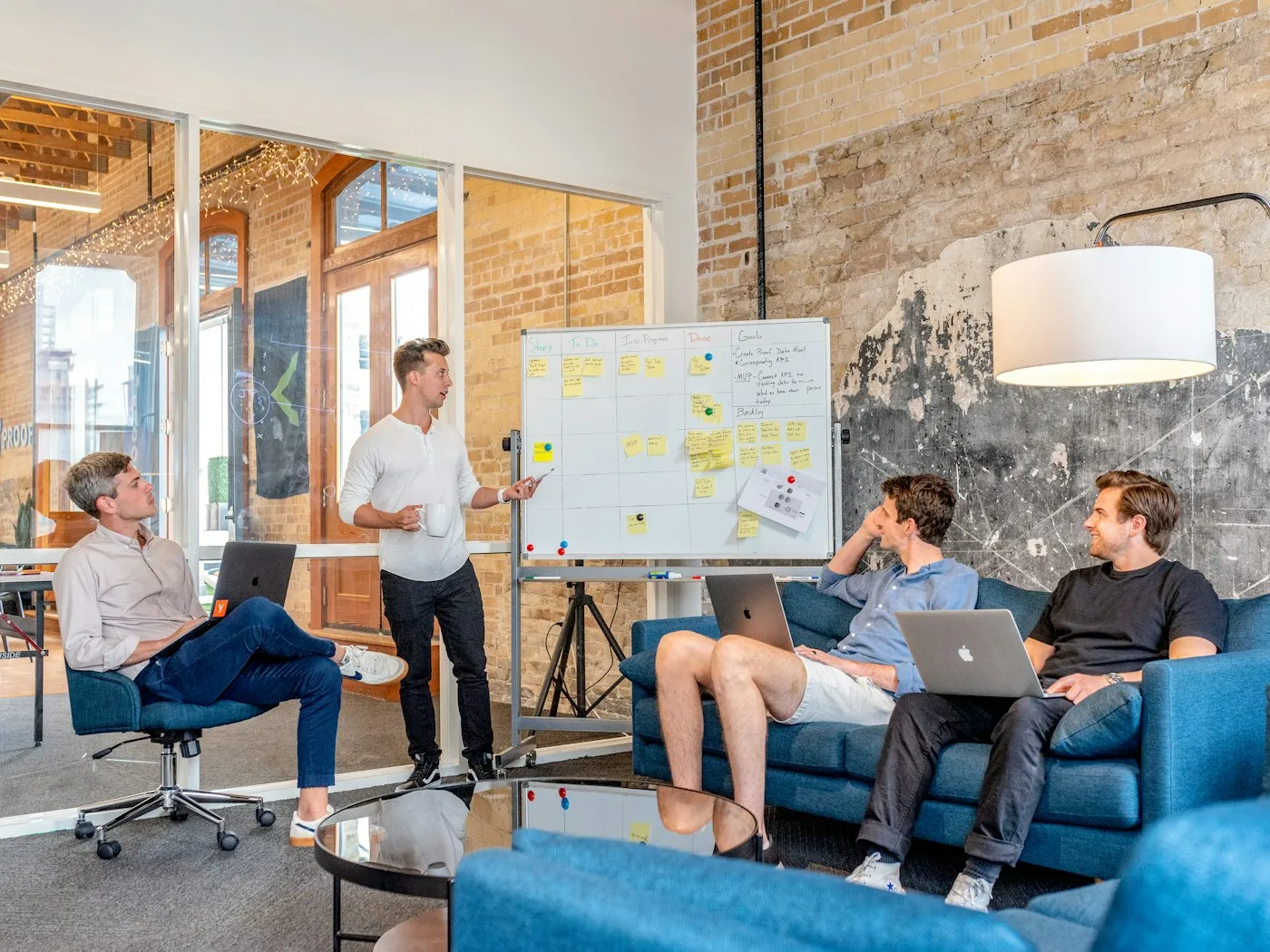 Team discussing architecture in front of a whiteboard